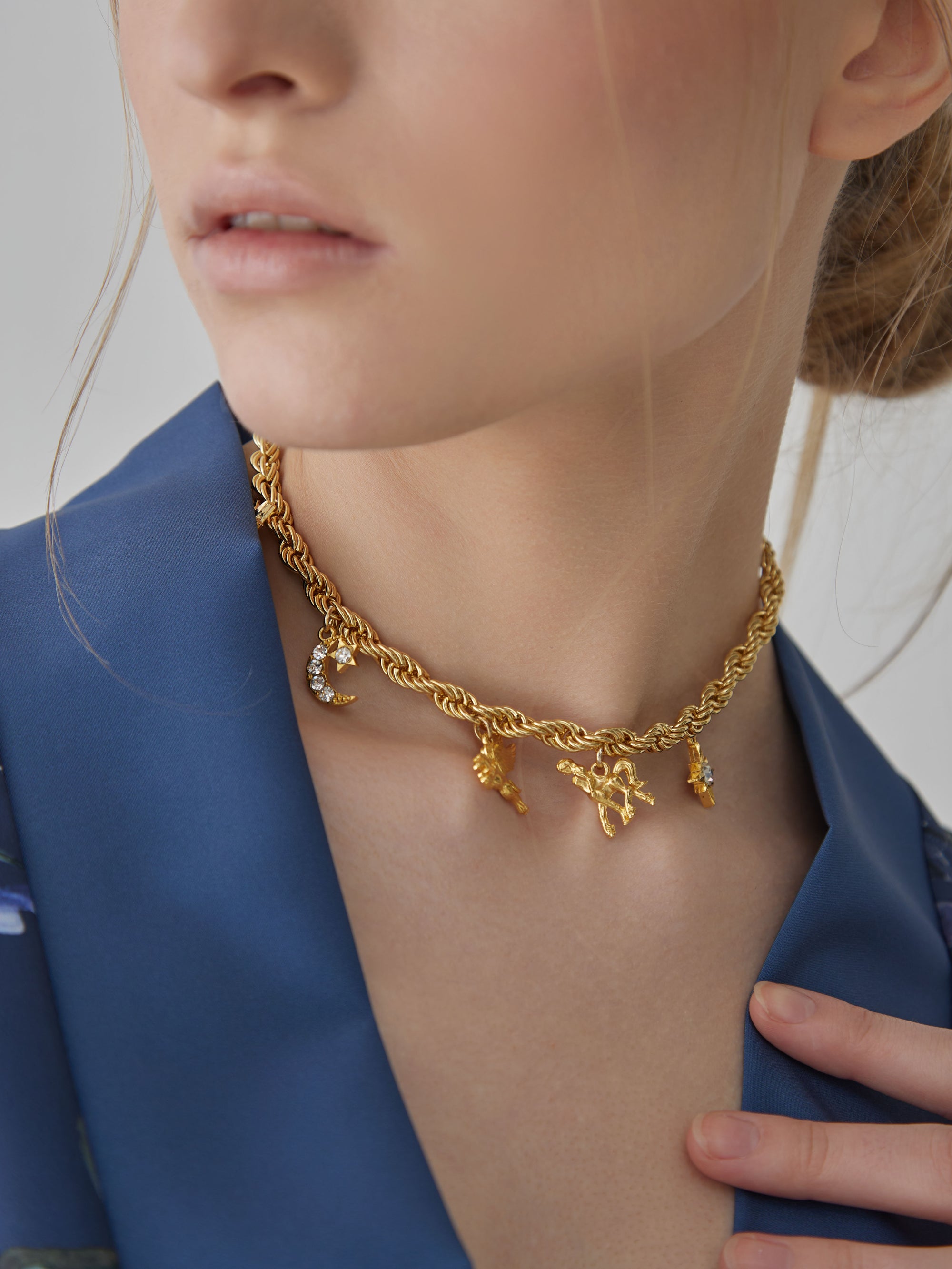 gold necklace with charms by Almarow Milano